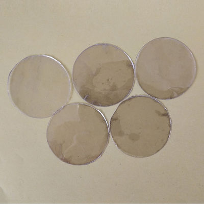 Lámina de mica de rubí moscovita de transporte irregular para microondas con un contenido de 0,4-0,6 CaO